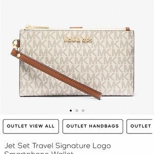 Michael Kors Jet Set Travel Wristlet
SOLD
